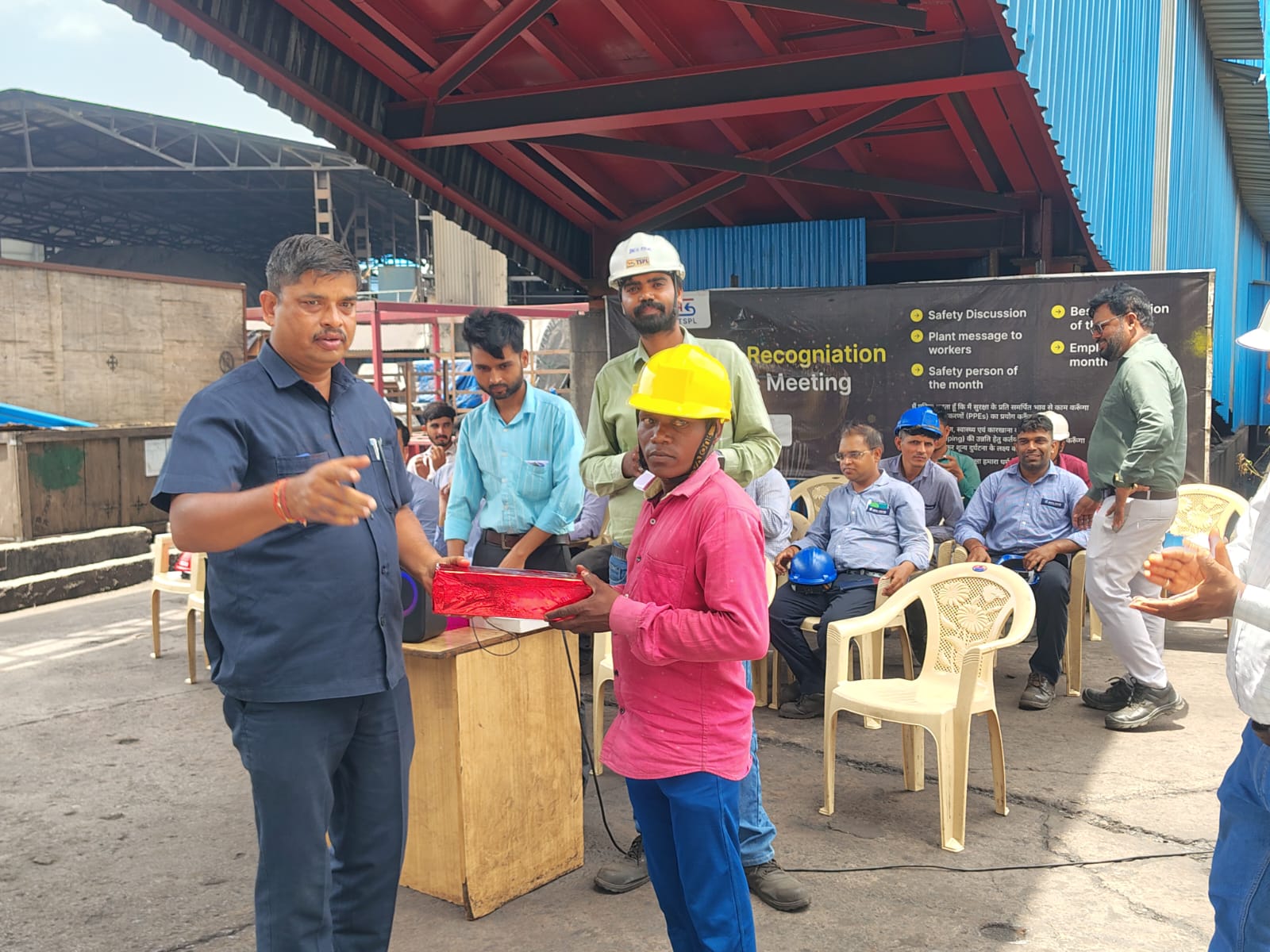 Workers gather for the monthly Safety Mass Meeting